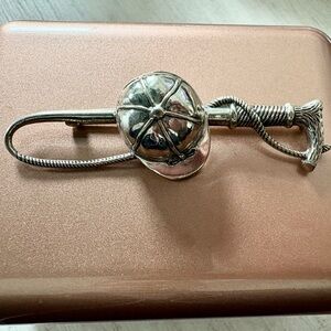 Beau Equestrian sterling pin with Riding cap and crop.